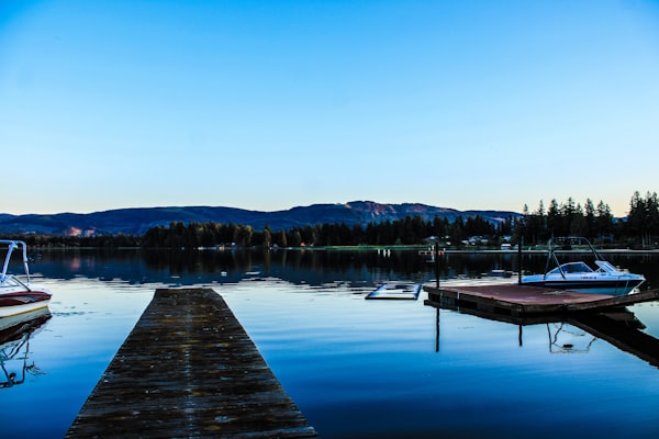 Lake dock at dusk representing the lakefront communities Greenbolt Electric serves
